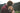 Owner hugging Henry the dog for review